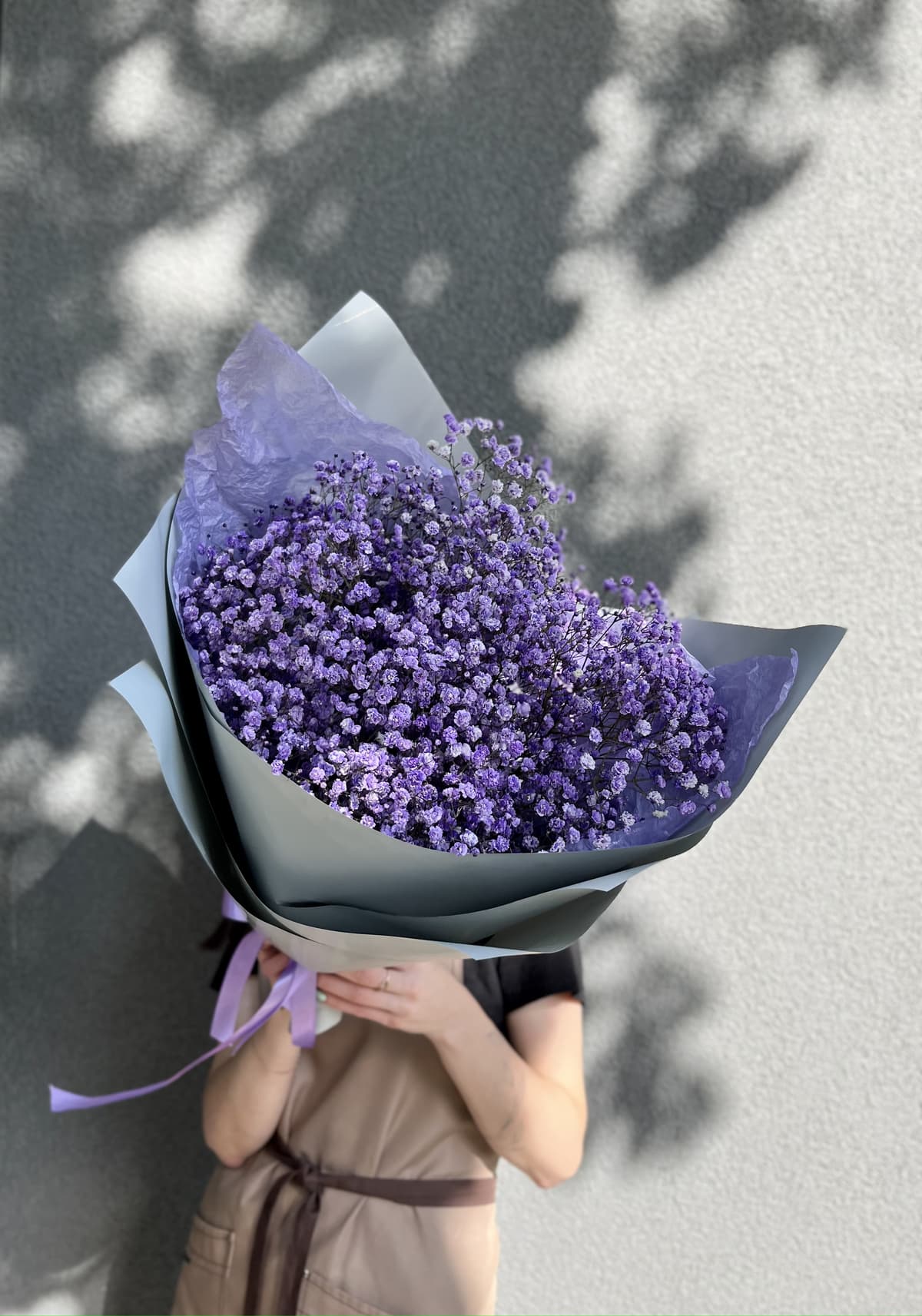 Стильный букет из 7 сиреневых Гипсофил в матовой бумаге